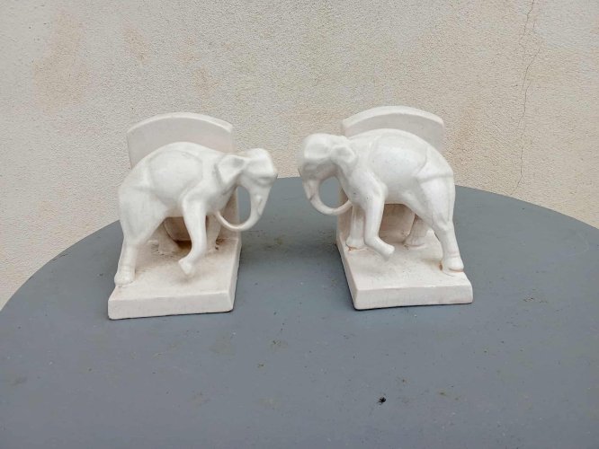 paire de serre-livres en faïence craquelée 