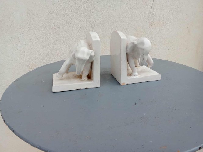 paire de serre-livres en faïence craquelée 