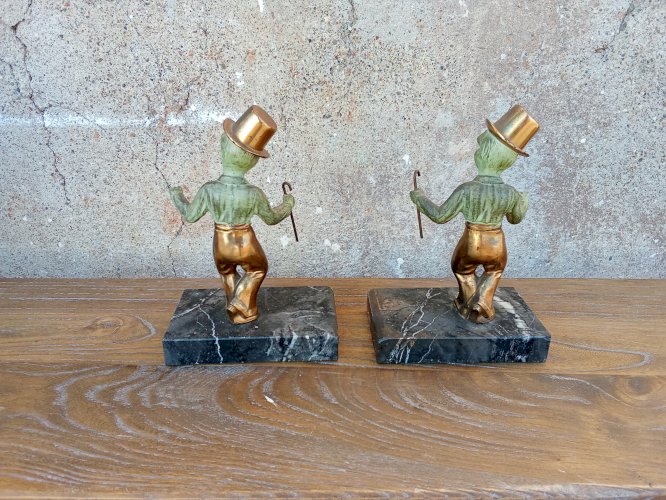 Paire de serre-livres original en métal patiné