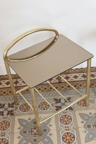 Paire de tables de chevet métal doré et plateau verre miroir