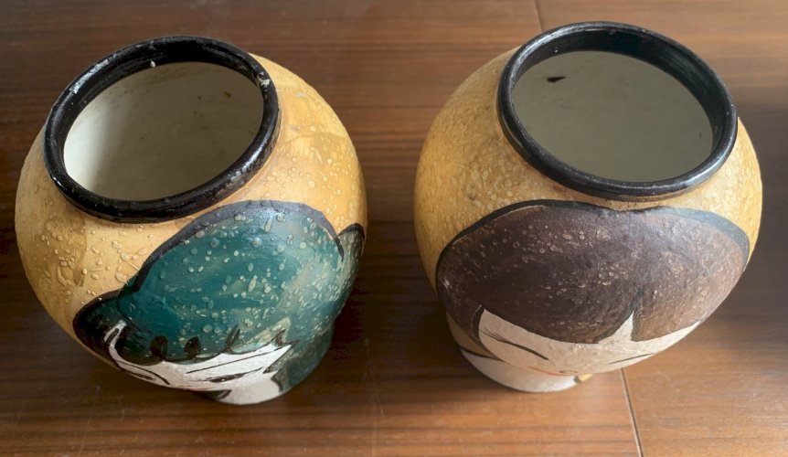 Paire de vases vintage céramique décor à têtes de femmes