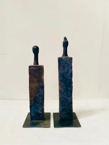 Paire d'objets sculptés en céramique émaillée XX siècle