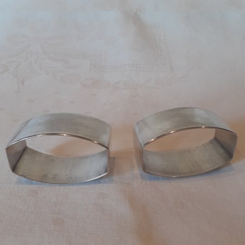 Paire ronds de serviette Art Déco métal argenté