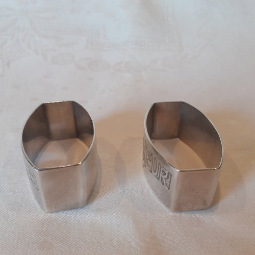 Paire ronds de serviette Art Déco métal argenté