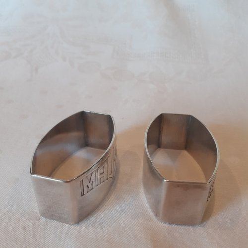 Paire ronds de serviette Art Déco métal argenté