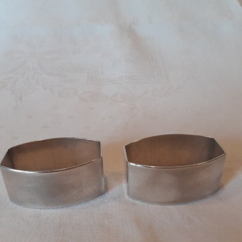 Paire ronds de serviette Art Déco métal argenté