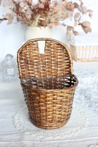 Vintage dark wicker wall basket