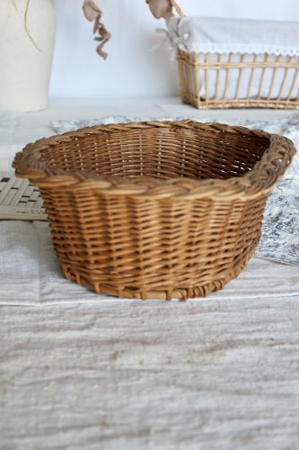 Panier ovale vintage en osier tressé à bordure tressée épaisse