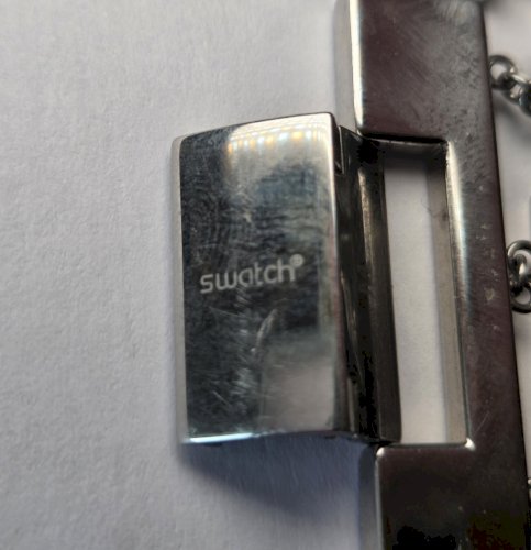 Parure, bracelet + bague, Swatch, en métal argenté ^