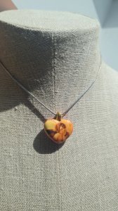 Angel pendant (after Raphael) in ceramic