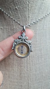 Antique silver compass pendant in Victorian style