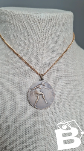 Pendentif en cuivre Danseuse par Henry Dropsy
