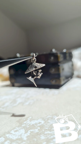 Pendentif homme asiatique en argent