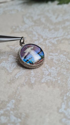 Pendentif religieux ancien en argent et une aile de papillon