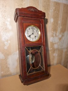Antique wall clock with chimes