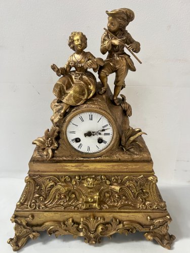 Pendule Romantique en bronze doré XIX siècle