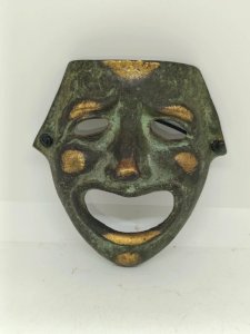 small bronze mask made in Greece in good condition