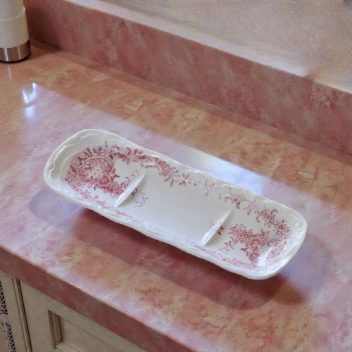 Petit plat XIXe en terre de fer rose