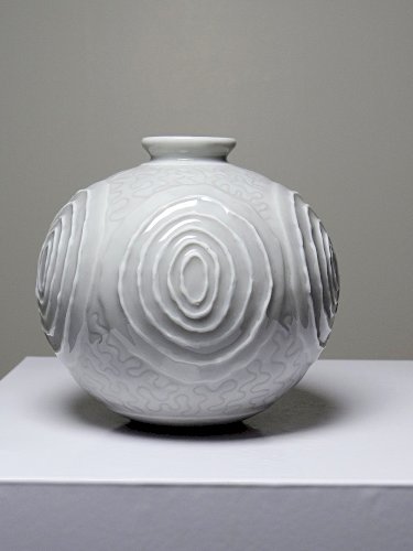 Petit vase boule en porcelaine style Art Déco 1935