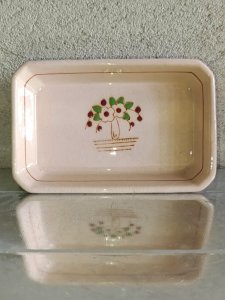 petit vide poche à decor floral signé longwy en bon etat
