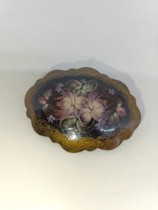 small hand-painted wooden brooch with floral design in good condition