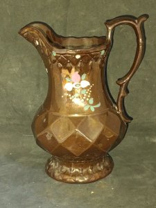 pichet à decor floral dit de jersey en bon etat