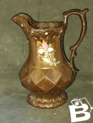 pichet à decor floral dit de jersey en bon etat