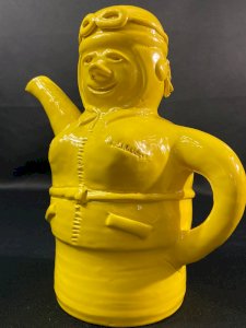 Anthropomorphic jug in yellow glazed stoneware signed and dated 1957