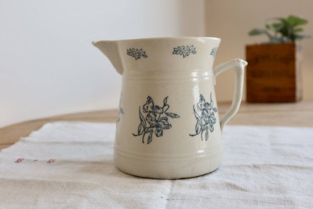 Antique earthenware pitcher from Saint-Uze with flower motif