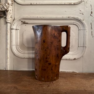 Brutalist wooden pitcher enhanced with nails, 20th-century folk art M3622