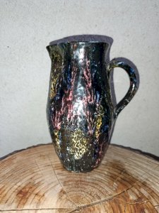 Multicolored drip pitcher in stoneware, the base? Signed Baudat in good condition.