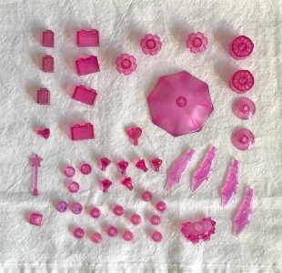 Translucent pink Lego pieces
