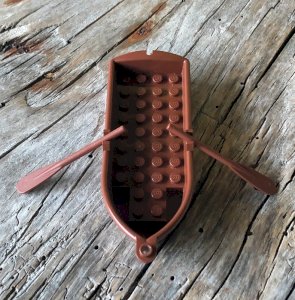 Lego boat and brown oars pieces/accessories