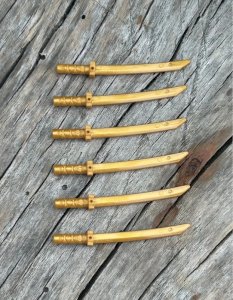 Lego pieces/accessories golden swords