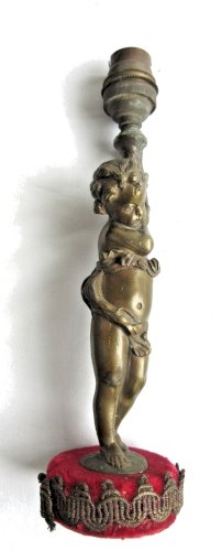 Pied de lampe Napoléon III en bronze à patine brune: Angelot portant le lumière
