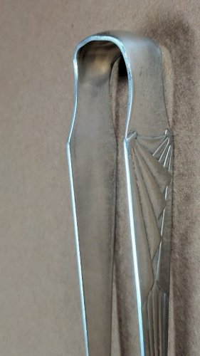 PINCE A SUCRE ART DECO EN METAL ARGENTE