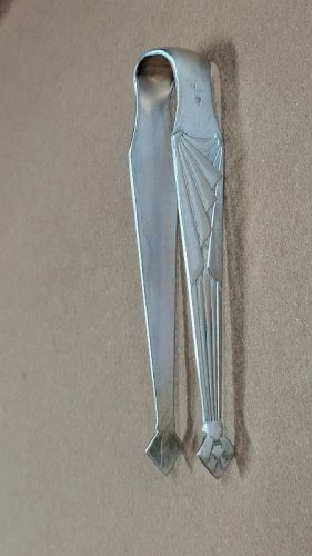 PINCE A SUCRE ART DECO EN METAL ARGENTE