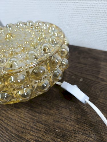 Plafonnier rond en verre bullé ambré Philips, 1960