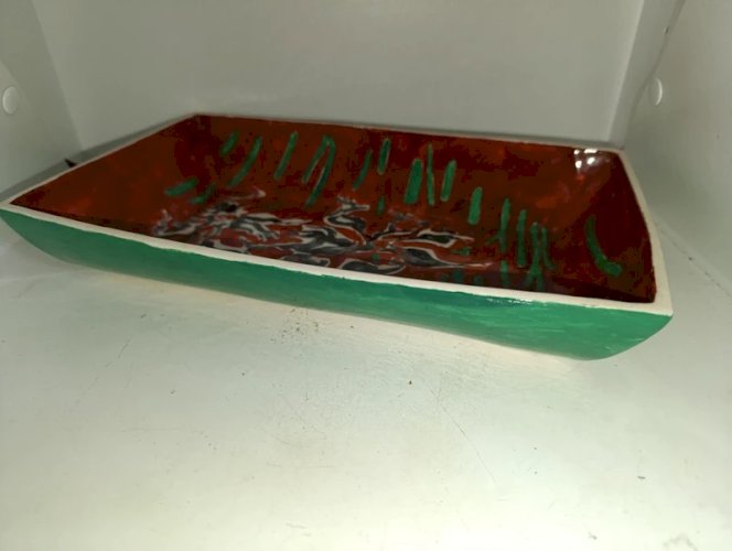 plat design signé Ceylon cermics en bon etat