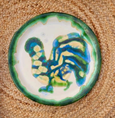 Plat en céramique à décor coq 