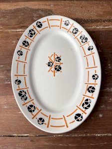 Plat en faïence ancienne Péxonne