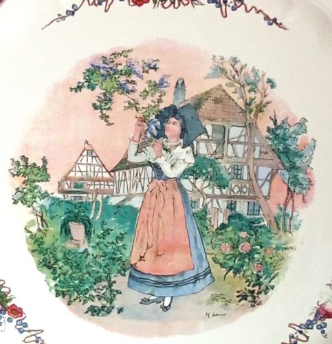 Plat en faïence Obernai/Sarreguemines – Signé Henry Loux – Scène alsacienne – Diamètre 34 cm – Faïence française vintage – Pièce rare et décorative