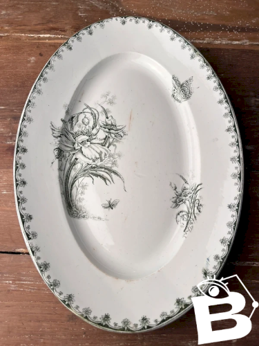 Plat en terre de fer fin XIXe, début XXe