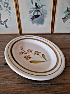 Plat oval en grès pyrité - motif de fleurs - made in Italie ?