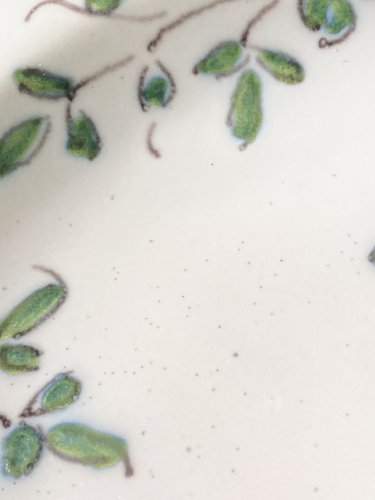 Plat ovale chantourné en faïence de Martres-Tolosane, héron en camaïeu de verts, XIXe siècle