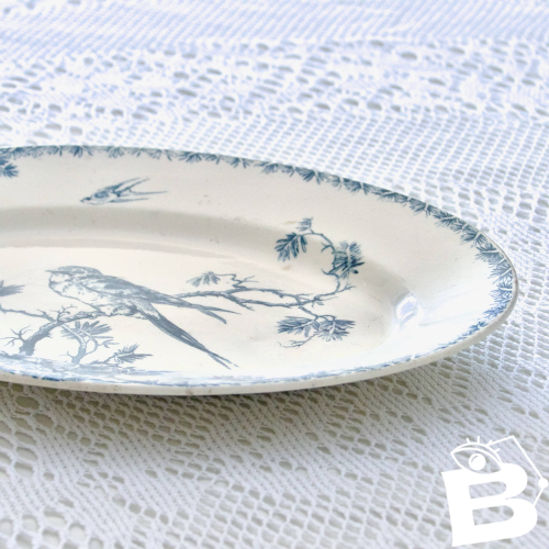 Plat ovale XIXe terre de fer Gien Provençal oiseaux hirondelles