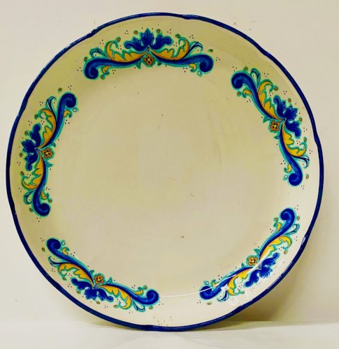 Plat rond en faience italienne XX siècle