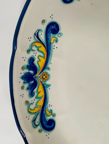 Plat rond en faience italienne XX siècle