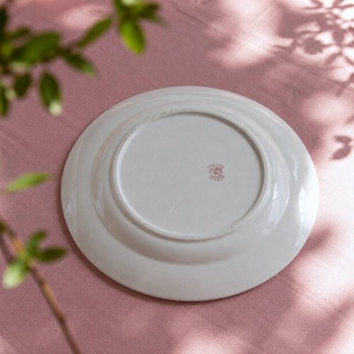 Plat rond XIXe terre de fer rose signé Maestricht Toulouse