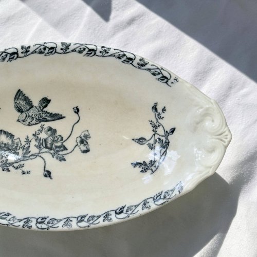 Plat terre de fer à loiseau du XIXe siècle signé Onnaing Coquelicots